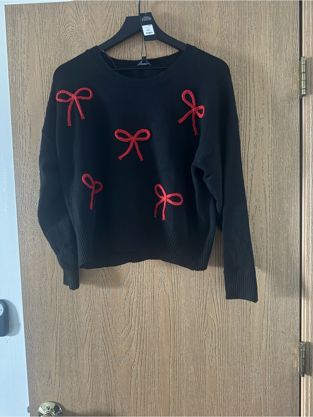 Fashion Nova Black Crewneck Sweater with Red Bow Accents